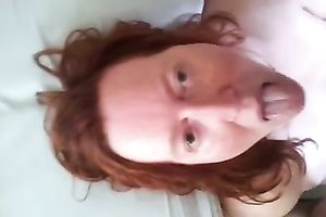 My redhead husband manages to milk my cock dry on her face