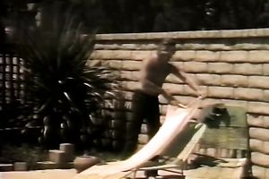 Two sexy lesbo girlfriend playing around by the poolside