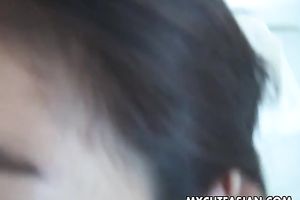 Asian beauty sucks a small pecker previous to taking it in her hairless bawdy cleft