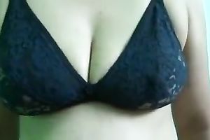 Chubby milf disrobes and demonstrates her large stomach and cleavage