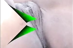 Lewd swarthy playgirl flashes her wazoo and slit on a beach