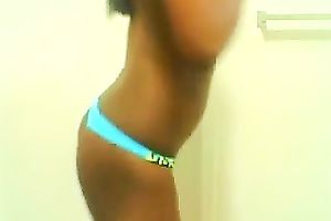 Ebony cutie demonstrates her slim body for the camera