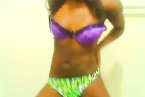 Ebony cutie demonstrates her slim body for the camera