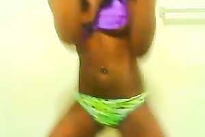 Ebony cutie demonstrates her slim body for the camera