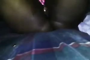 Wet and bulky dark honeypot shoved with a sex tool for squirting