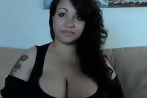 My dark-haired girlfriend is very proud of her giant mounds