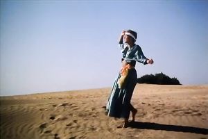 Hungry chap is going to eat curly slit of his titless fair haired babe in desert