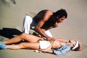 Hungry chap is going to eat curly slit of his titless fair haired babe in desert