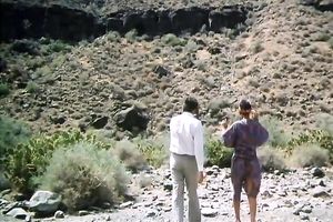 Hungry chap is going to eat curly slit of his titless fair haired babe in desert