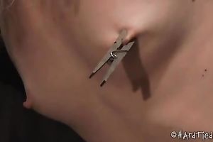 Small titted blondie fastened with ropes is tortured in barn