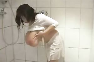 Playing with my biggest succulent breasts in front of a camera