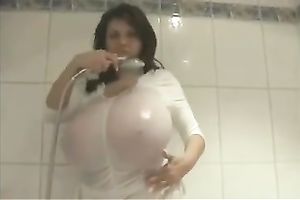 Playing with my biggest succulent breasts in front of a camera