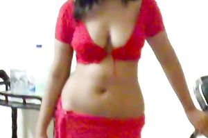 My glamorous Indian honey shows off her curvy body wearing tempting red dress