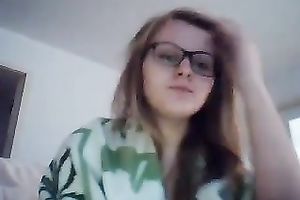 Nerdy dilettante legal age teenager fingers her pussy in web camera solo clip