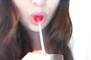 Licking a sweetmeat and playing with my big natural boobs