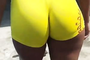 Breathtaking yellow constricted shorts on the round gazoo of my milf babe