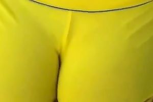 Breathtaking yellow constricted shorts on the round gazoo of my milf babe