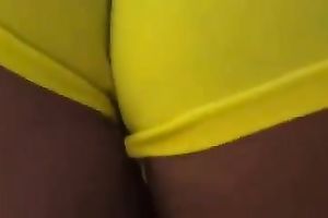 Breathtaking yellow constricted shorts on the round gazoo of my milf babe