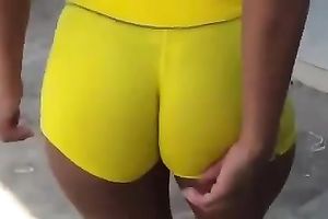Breathtaking yellow constricted shorts on the round gazoo of my milf babe