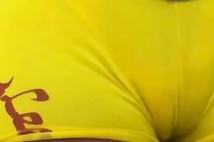 Breathtaking yellow constricted shorts on the round gazoo of my milf babe