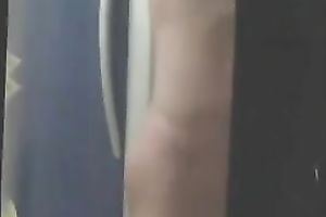 Hidden webcam movie with a super fit dark brown taking her raiment off