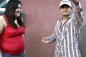 Chubby dark brown Lindsey lifts her jeans skirt up and receives her twat finger drilled