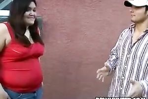 Chubby dark brown Lindsey lifts her jeans skirt up and receives her twat finger drilled