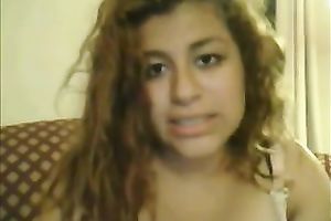 Sexy chunky Latina enjoys playing with her large natural love muffins