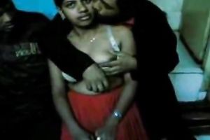 Perverted desi caresses Indian girl's bra buddies in front of the camera