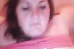 Fat woman fingering her fur pie in her bedroom all alone