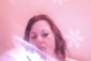 Fat woman fingering her fur pie in her bedroom all alone