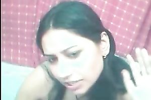 Beautiful brunette hair lalin girl on web camera feels sexually excited and wild