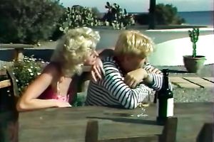 Two vintage whores on the beach share pecker of shaggy dude