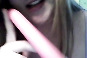 Amateur cutie licks a sex tool and plays with her breathtaking pantoons