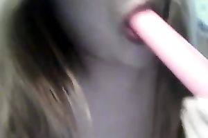 Amateur cutie licks a sex tool and plays with her breathtaking pantoons