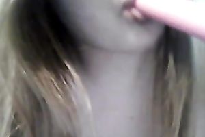 Amateur cutie licks a sex tool and plays with her breathtaking pantoons