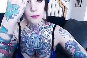 Heavily tattooed hoochie shows off her milk cans and a-hole