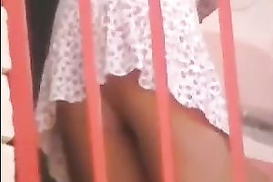 Hot small golden-haired neighbour on the balcony filmed upskirt