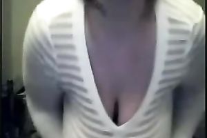 Webcam solo with a juggy brunette hair milf showing her milk cans