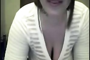 Webcam solo with a juggy brunette hair milf showing her milk cans