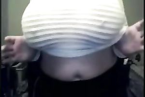 Webcam solo with a juggy brunette hair milf showing her milk cans