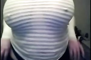 Webcam solo with a juggy brunette hair milf showing her milk cans