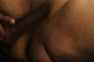 A salacious big beautiful woman enjoys drilling her cookie with a fake penis