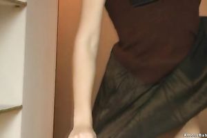 Blonde honey Carol demonstrates her skinny body in the kitchen