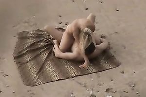 Beautiful blond playgirl on the beach screwed her partner