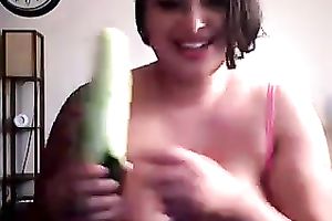 Thick and breasty brunette hair strumpet on cam plays with a cucumber