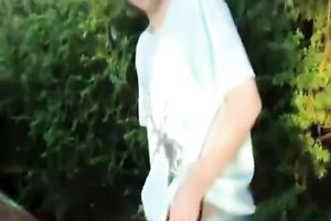 Long-haired redhead beauty acquires her cookie invaded in the forest