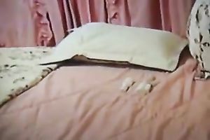 Dark-haired sweetheart masturbates her shaggy cookie in homemade solo movie scene