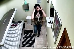 Wondrous brunette hair lassie tans her body in elite spa salon