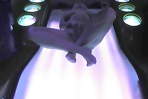 Hidden livecam act with a gal masturbating in solarium